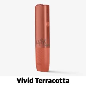 IQOS ILUMA i ONE Vivid Terracotta in a metallic burnt orange finish, standing vertically with LED indicators.